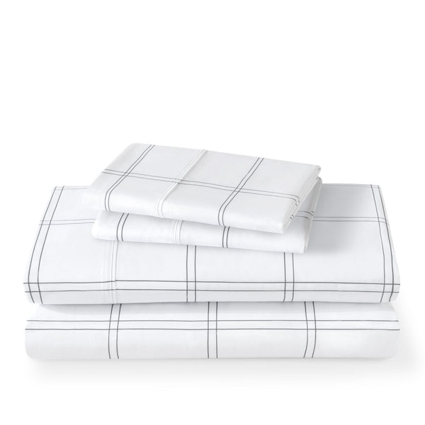 Plaid sheet set folded and stacked