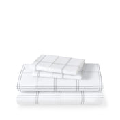 Plaid sheet set folded and stacked