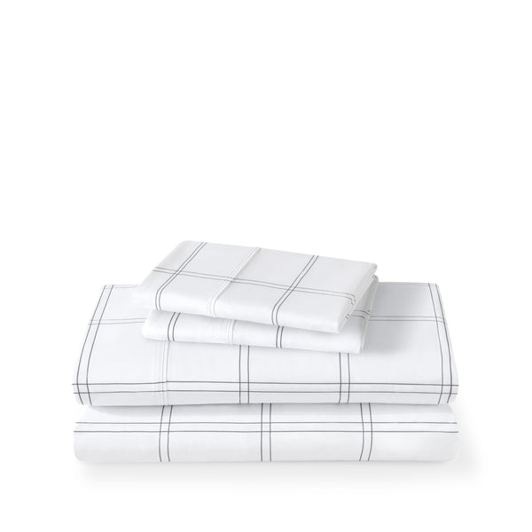 Plaid sheet set folded and stacked