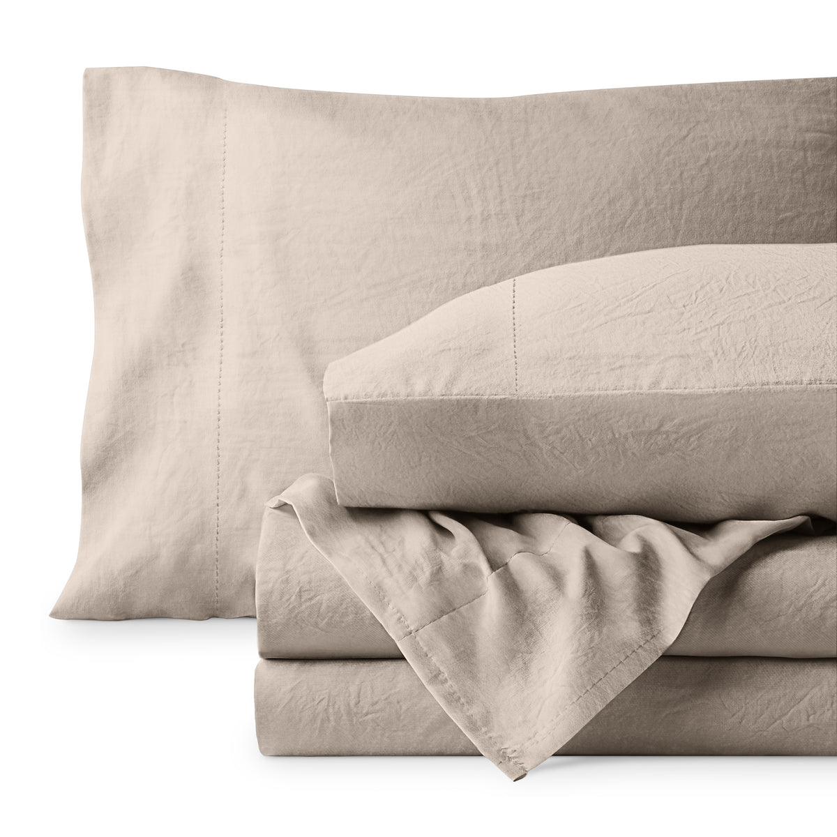 Washed microfiber sheet set folded and stacked on a white background