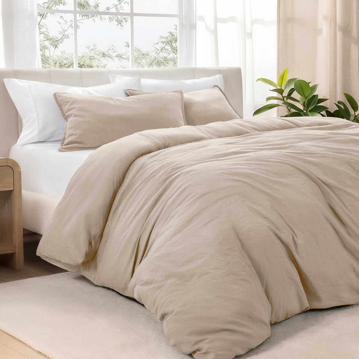 Bedding set on a bed in a bright room with natural light