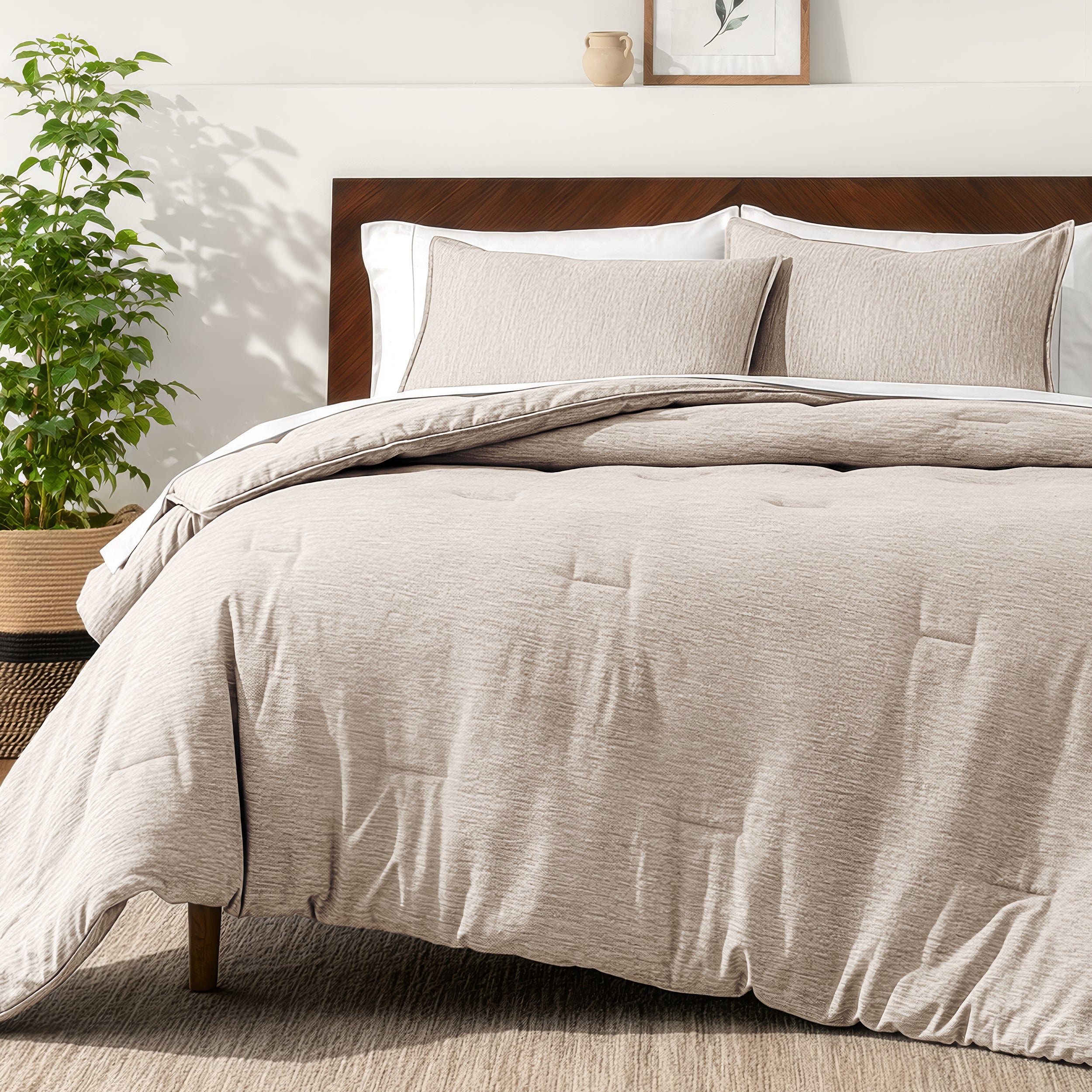 Bedding set on a bed in a bedroom with a side table and lamp.