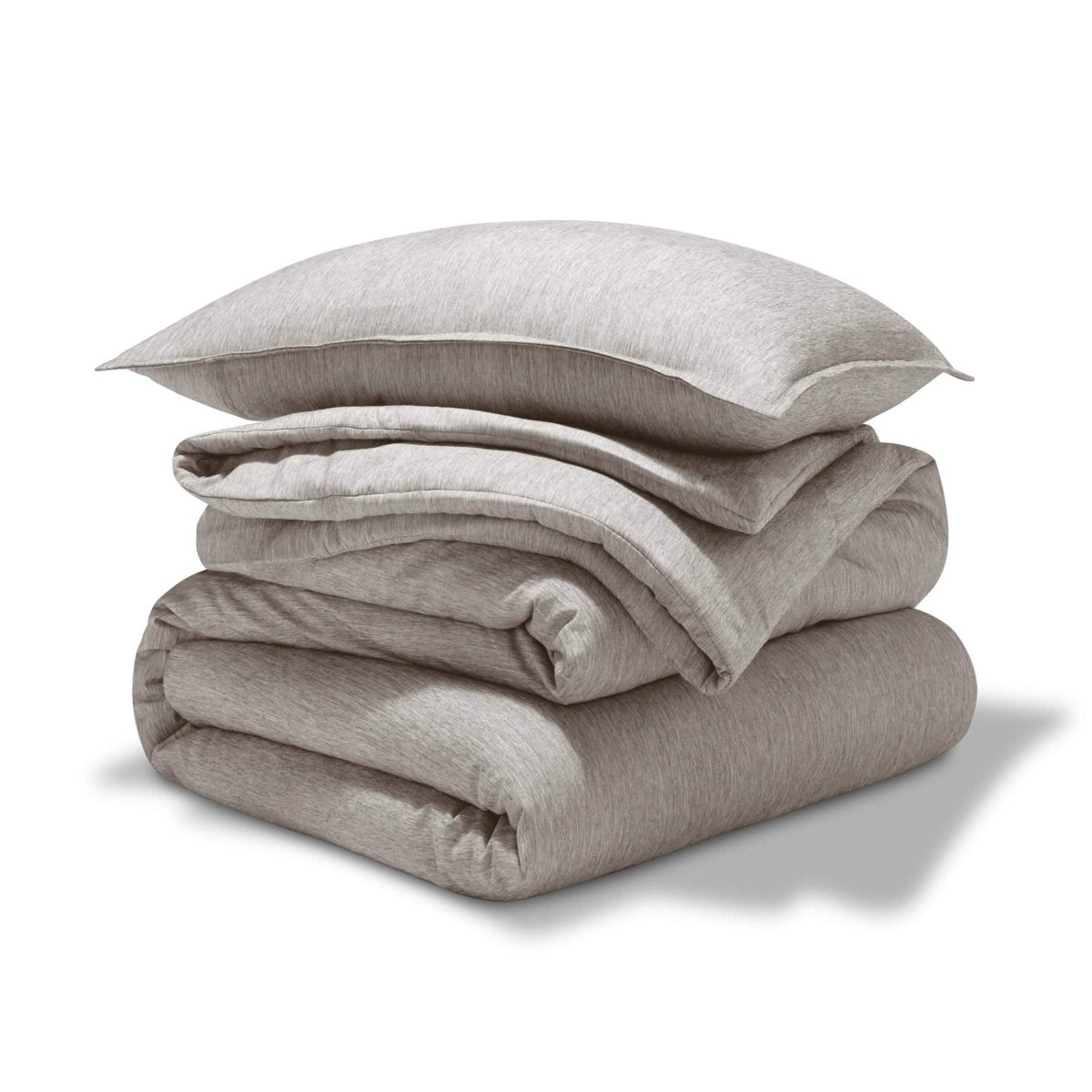 A comforter set folded and stacked