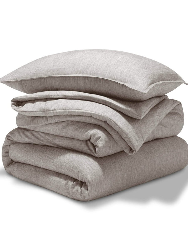 A comforter set folded and stacked