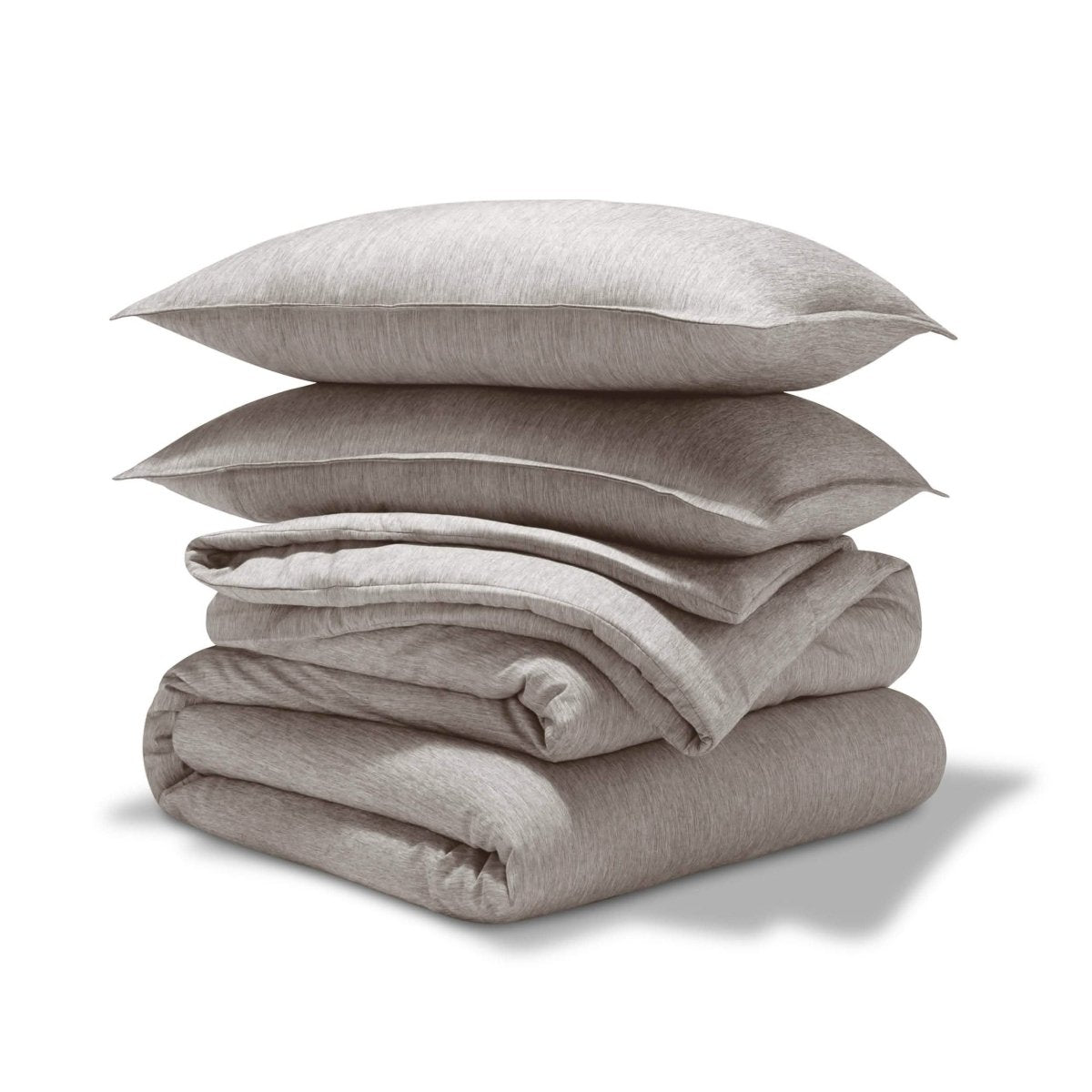 A comforter set folded and stacked