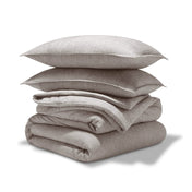 A comforter set folded and stacked