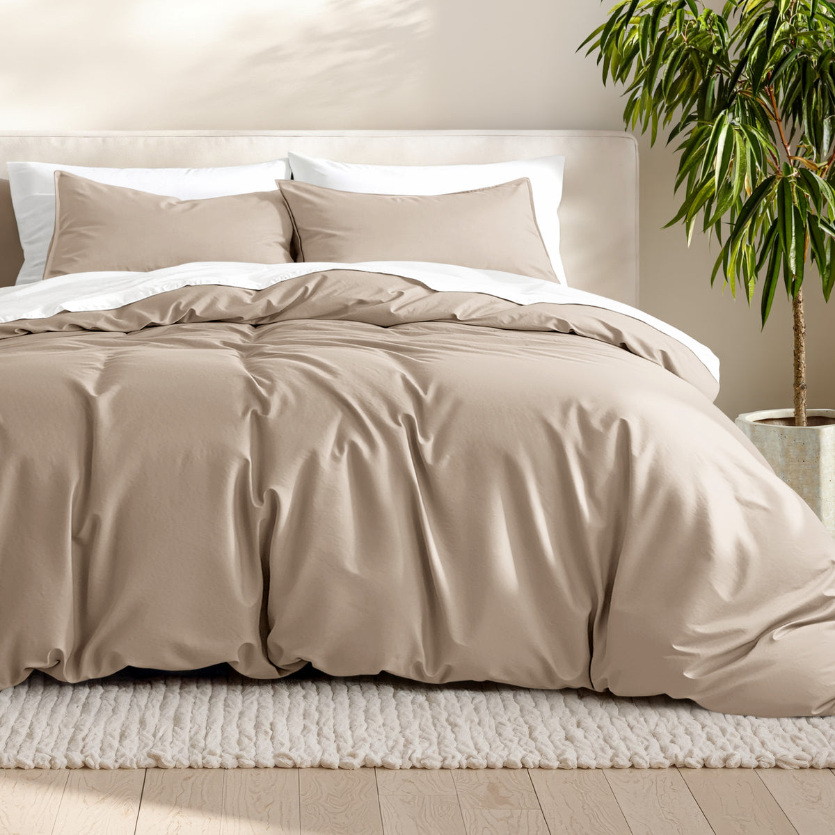 Microfiber bedding set on a bed with a neutral background
