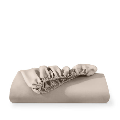 Microfiber fitted sheet folded with a white background