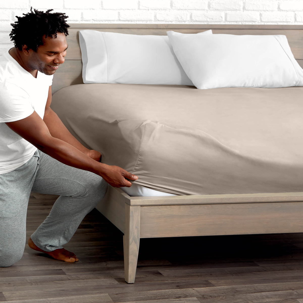 Ultra soft fitted sheet on a mattress with the sun shining into the bedroom
