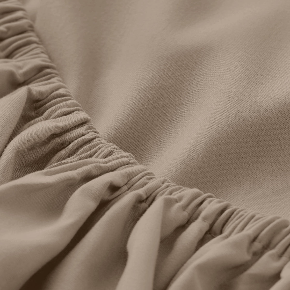 Close-up of fitted sheet with all around elastic