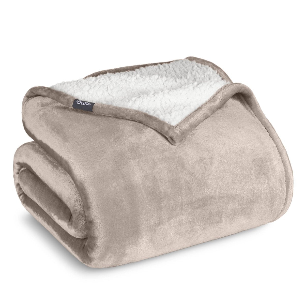 A sherpa blanket folded neatly while showing both sides