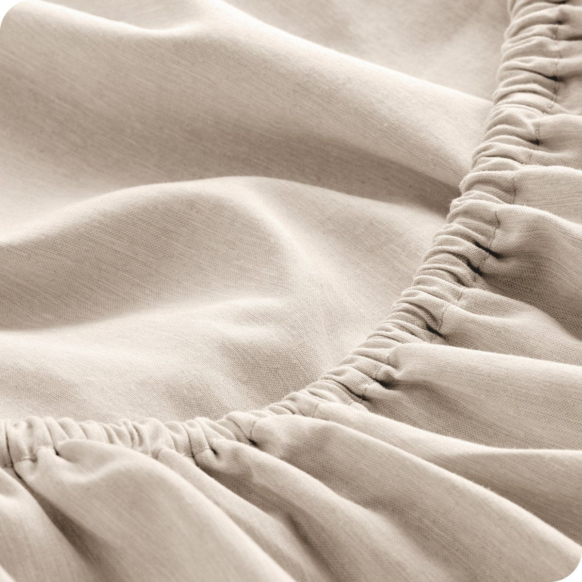 Close-up of fitted sheet with elastic edge