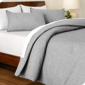A comforter set on a bed