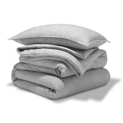 A comforter set folded and stacked