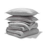A comforter set folded and stacked