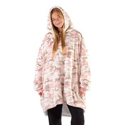 An adult with a sherpa wearable blanket on
