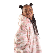 A child with a wearable blanket on
