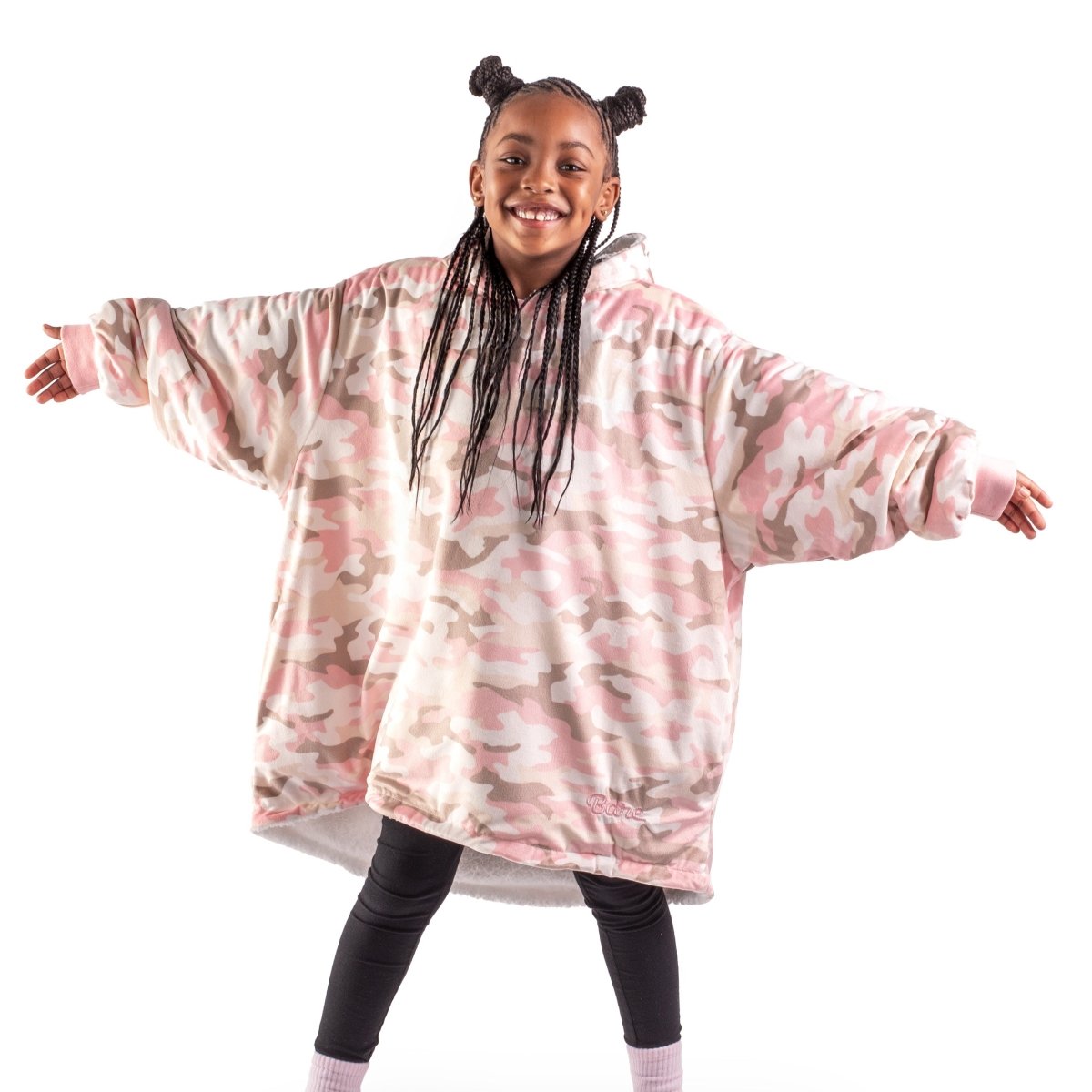 A child wearing a hooded blanket