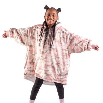 A child wearing a hooded blanket