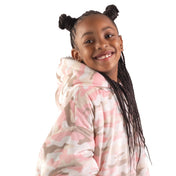 Child wearing a Bare Home wearable blanket
