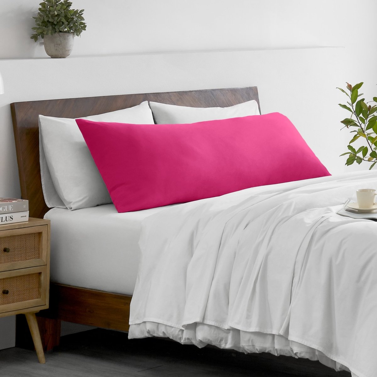 Bed with microfiber bedding and wooden headboard in a bedroom setting