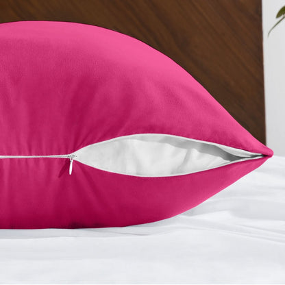 Body pillowcase with a zipper closure on a bed with a wooden headboard