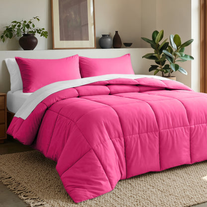 Comforter set on a bed in a bedroom with plants and decor.