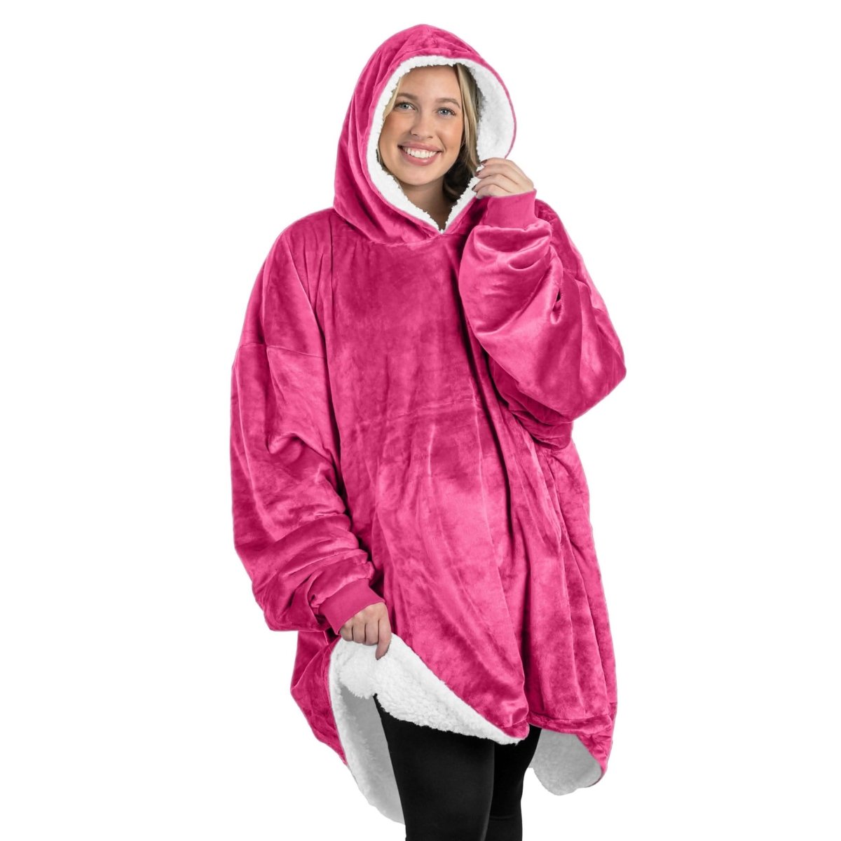 An adult with a sherpa wearable blanket on