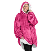 An adult with a sherpa wearable blanket on