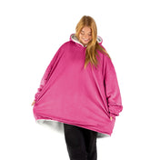 An adult with a wearable blanket on