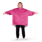 An adult with a sherpa wearable blanket on
