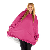 An adult with a sherpa wearable blanket on