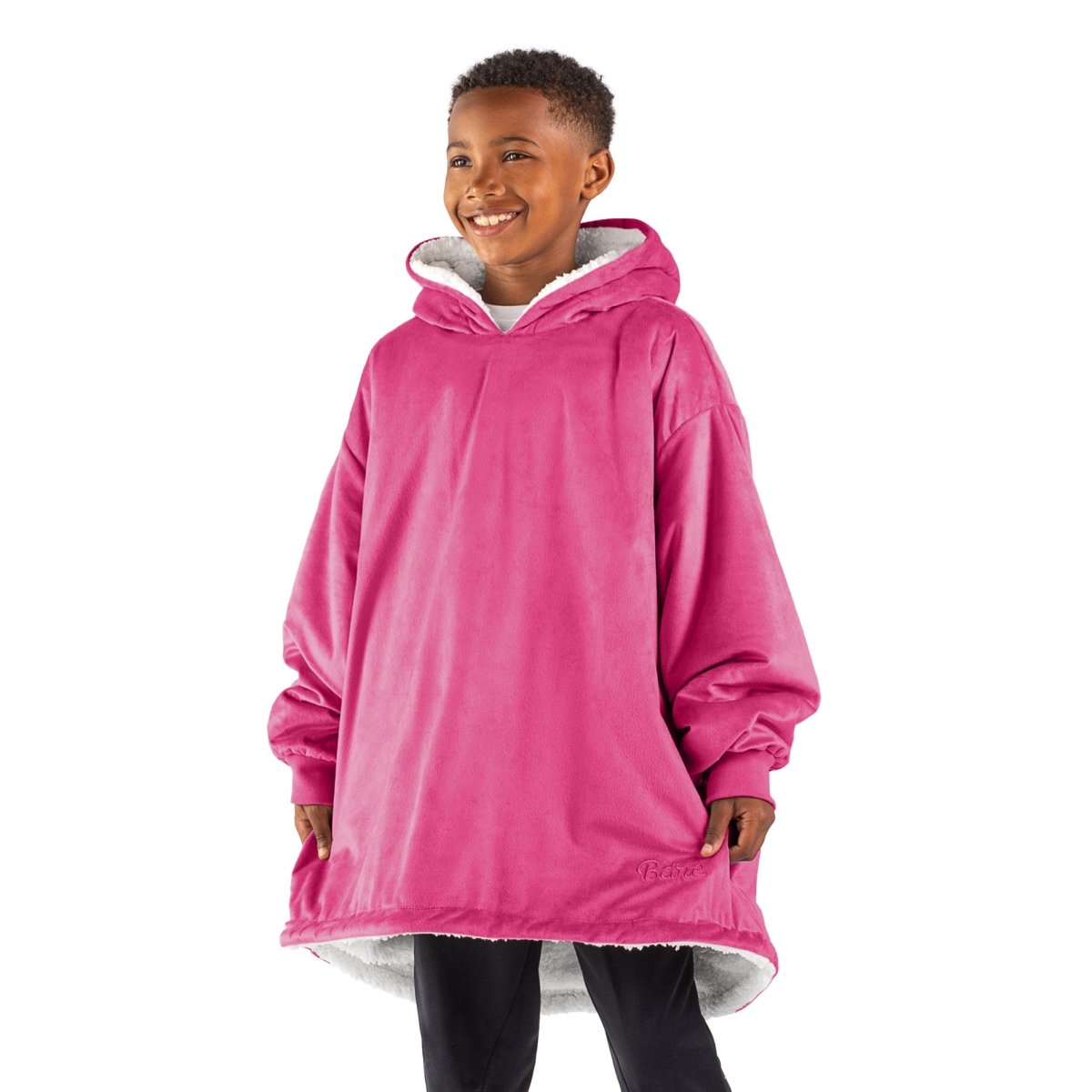 A child with a sherpa wearable blanket on