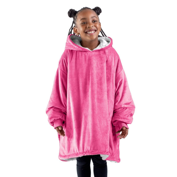 A child with a sherpa wearable blanket on