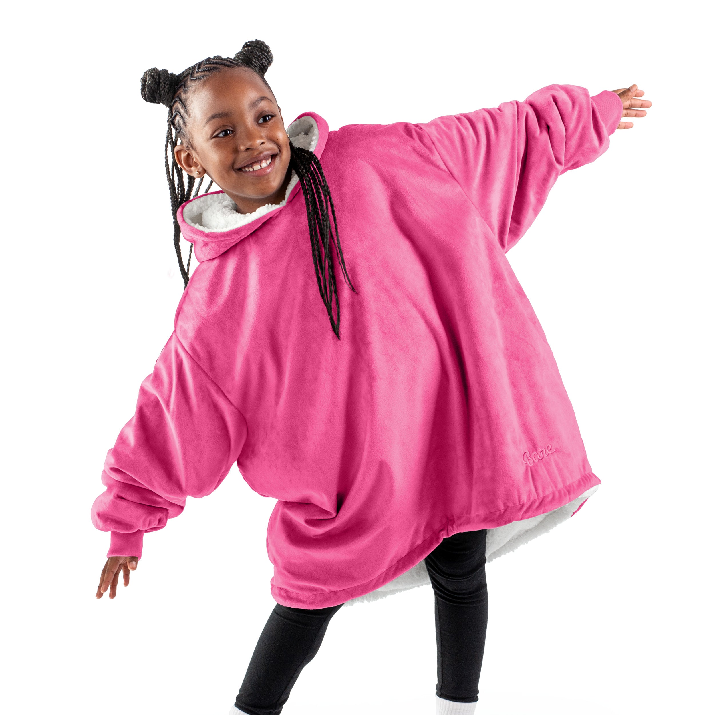 A child with a wearable blanket on