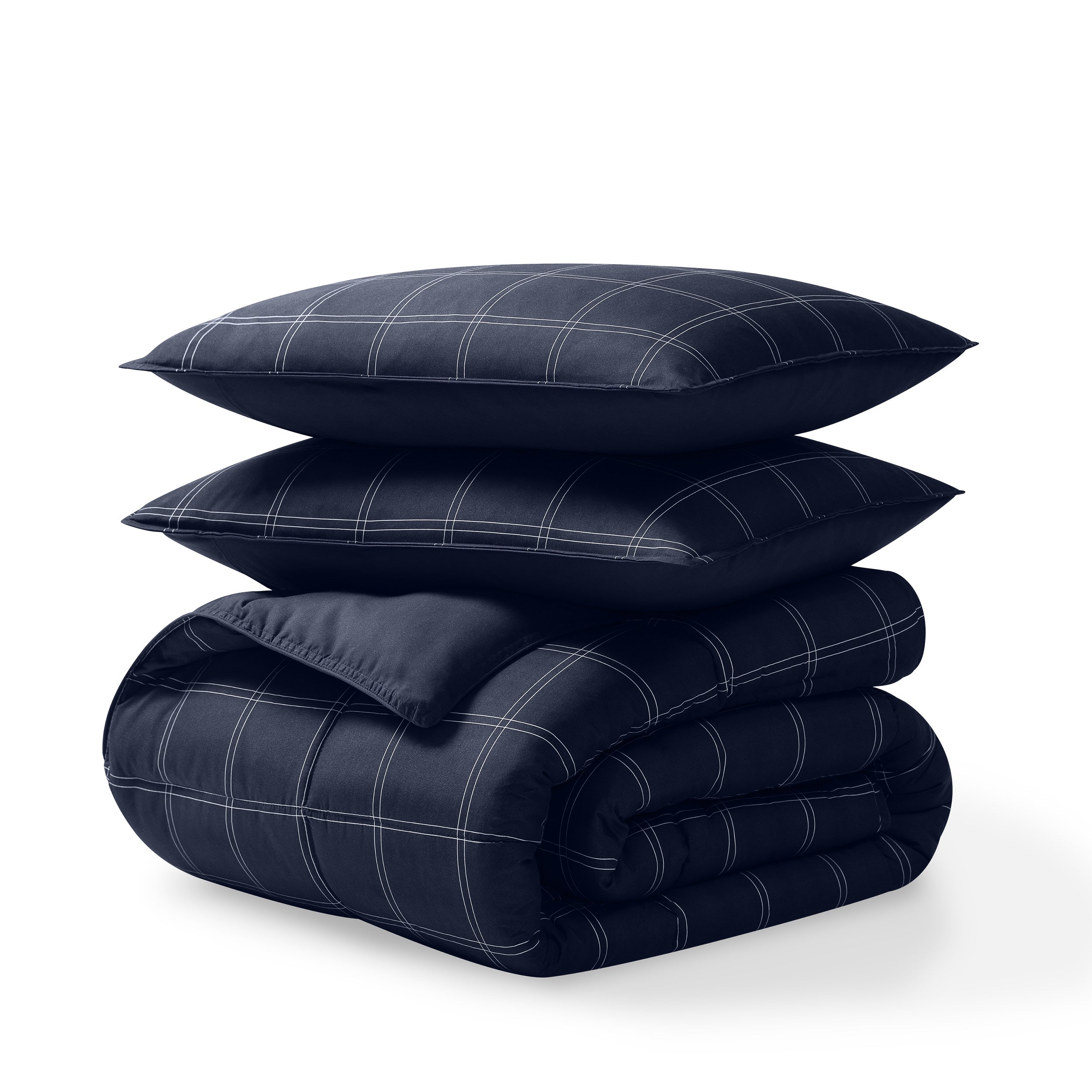 Comforter and pillow shams on a white background