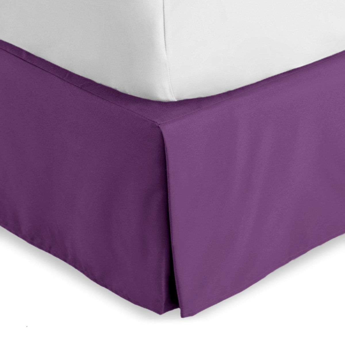 Bed skirt on a bed with white bedding