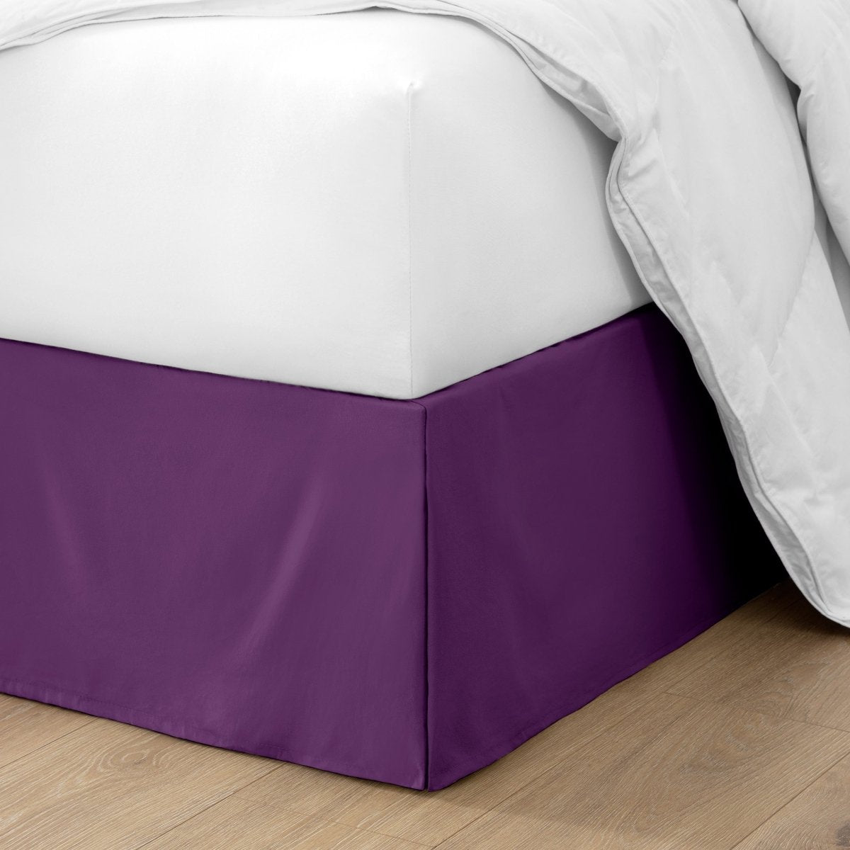Ultra soft bed skirt on a bed with white bedding.