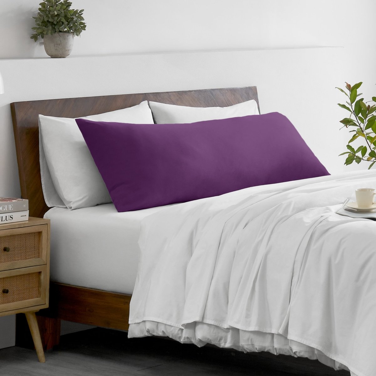 Bed with microfiber bedding and wooden headboard in a bedroom setting