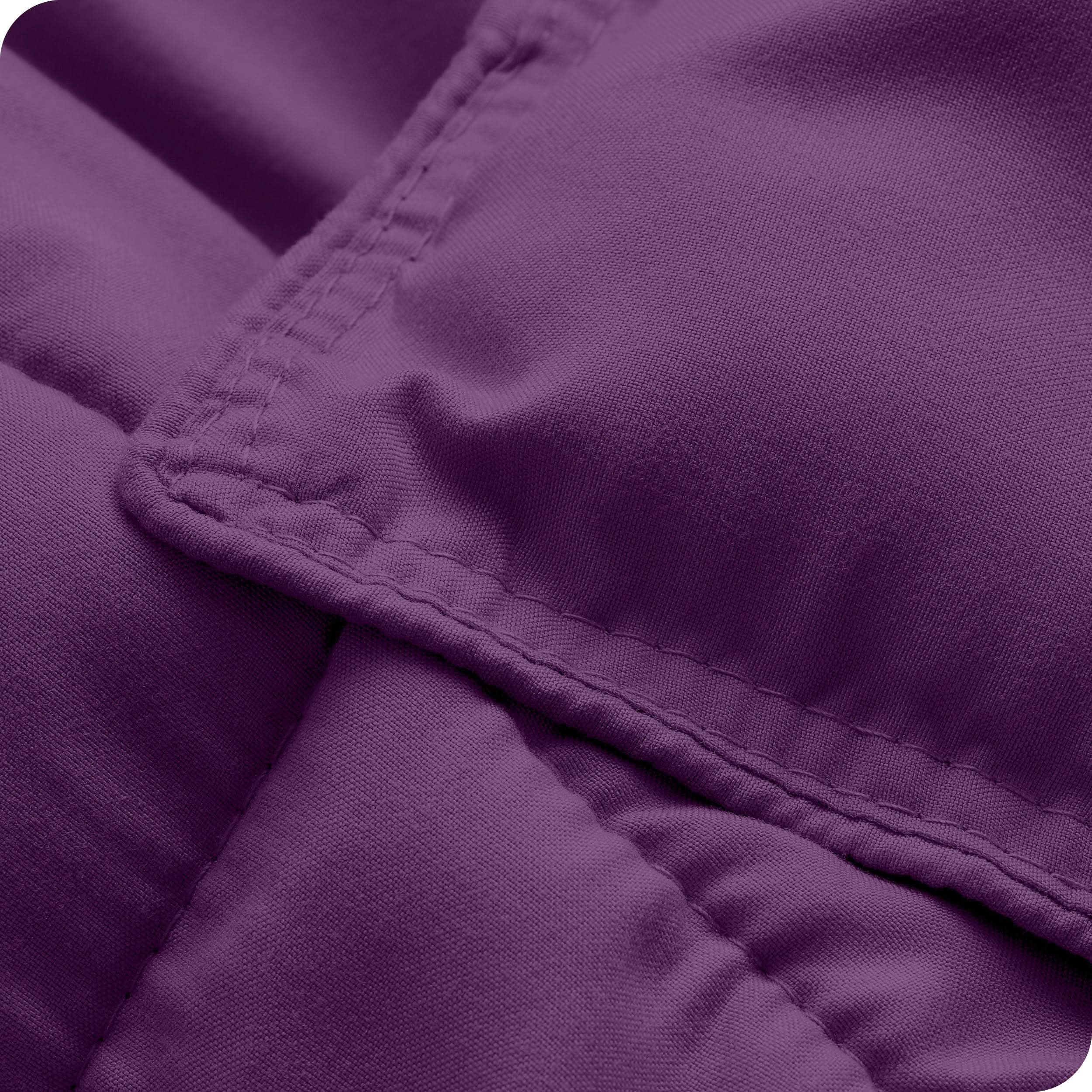 A close up of a corner of the microfiber comforter