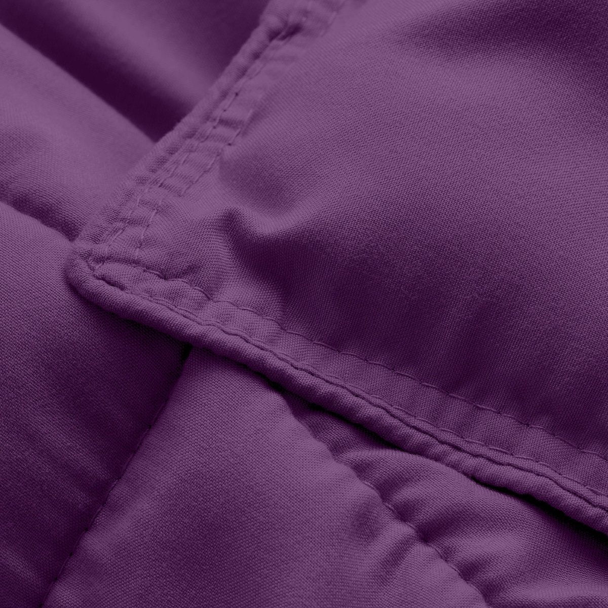 Close-up of comforter fabric with stitching detail