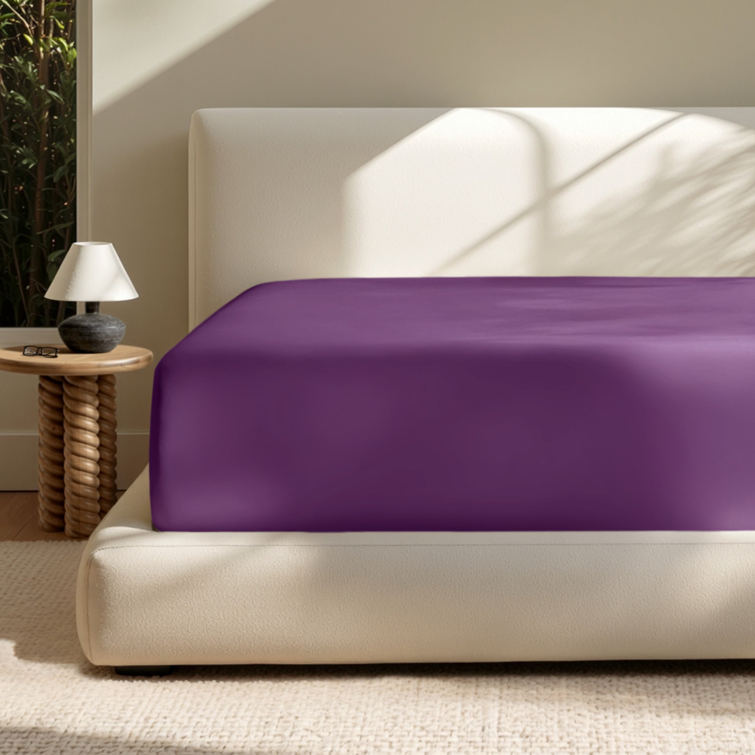 A deep pocket mattress with a fitted sheet on it
