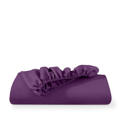 Microfiber fitted sheet folded with a white background