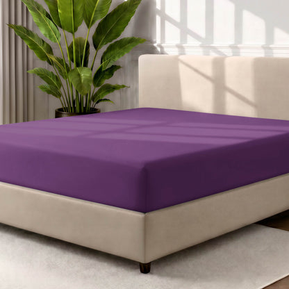 Ultra soft fitted sheet on a mattress with the sun shining into the bedroom