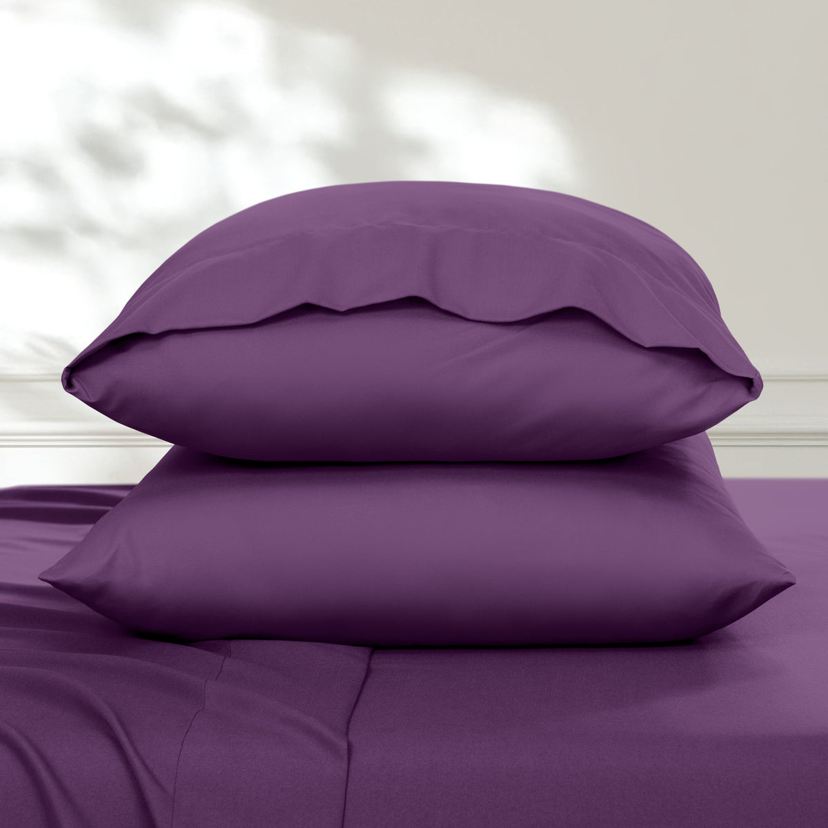 2 pillowcases on pillows