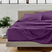A modern bedroom with microfiber sheets on the mattress