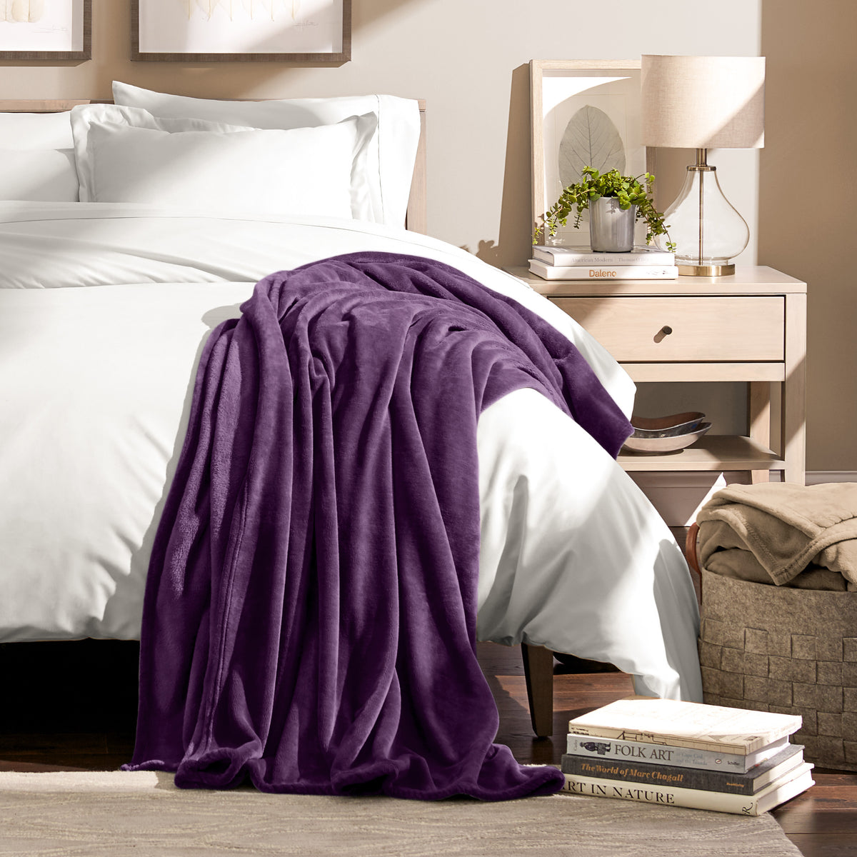 Microplush blanket draped over the corner of a bed