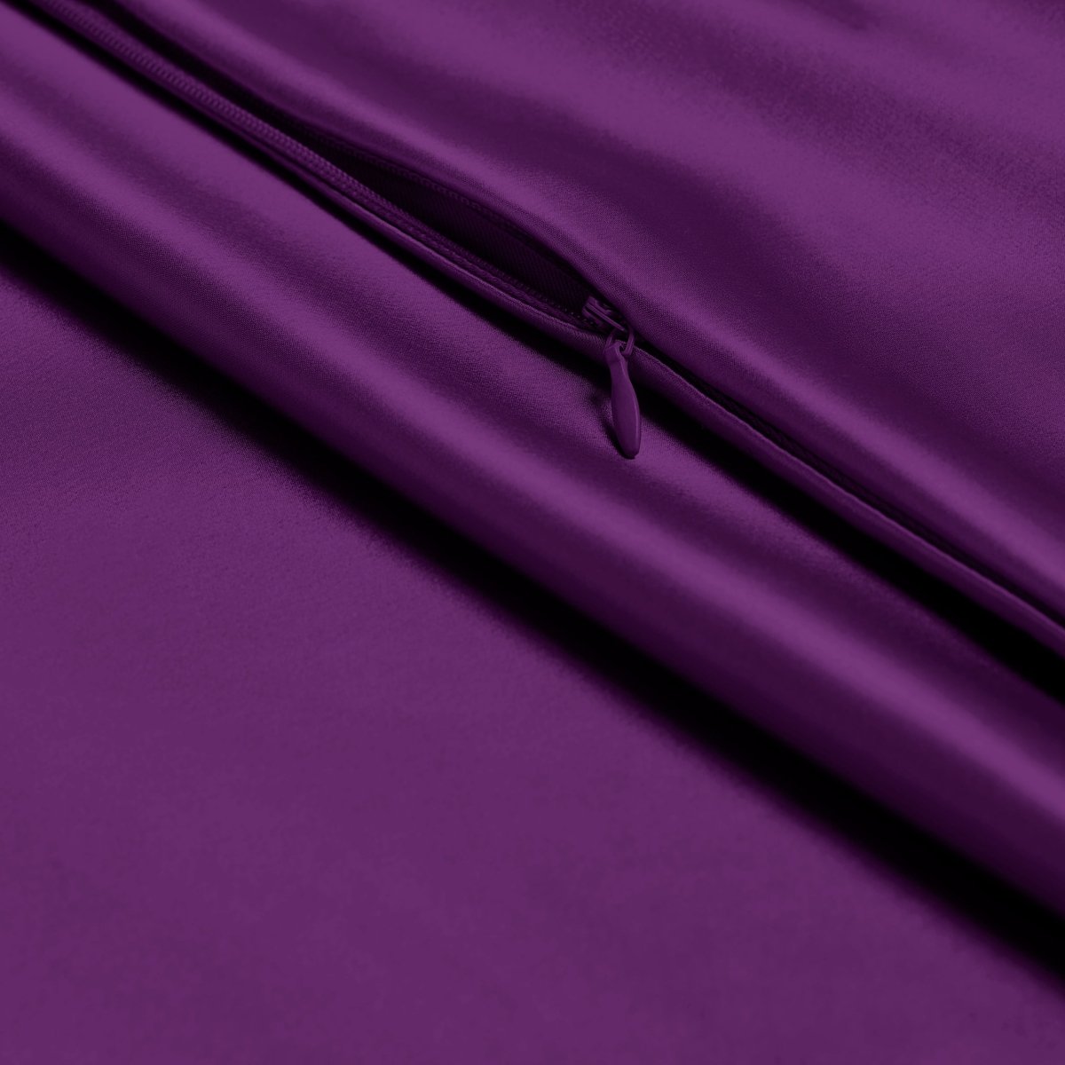 Close-up of poly satin pillowcase with a zipper