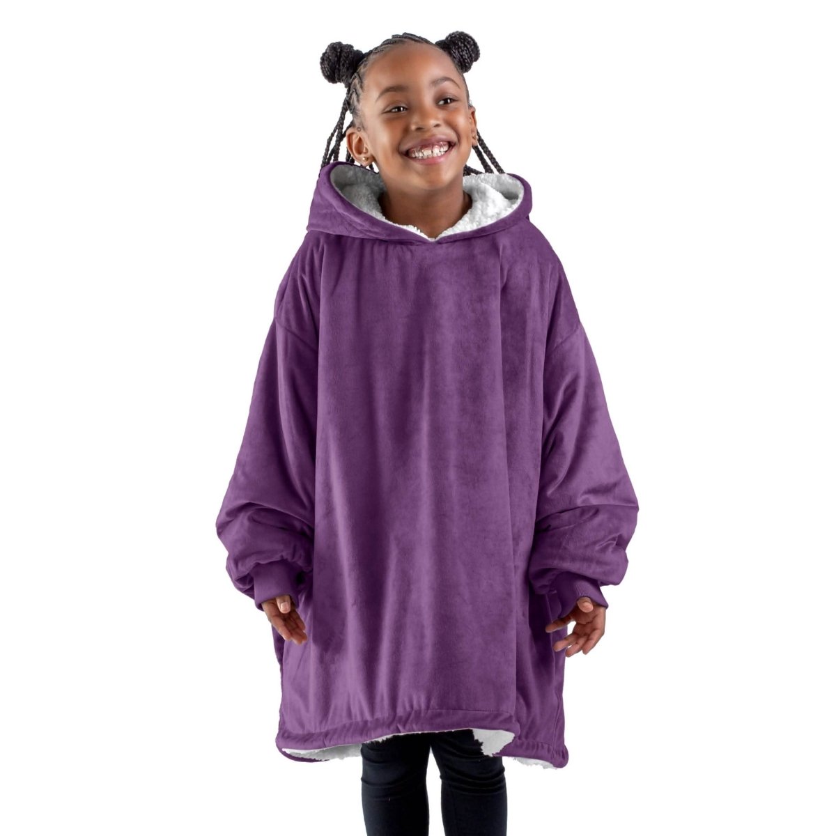 A child with a sherpa wearable blanket on