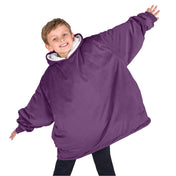 A child with a wearable blanket on